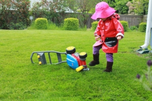 Darn that clogged blade. She's actually kicking it like Daddy did.