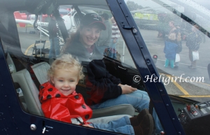 Sweetness and Mommy in a Robinson R44. Not sure how I feel that this was the helicopter she insisted on playing with the most...
