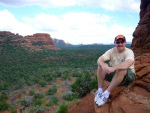 Hubby up on Boyton Spire, with Sedona in the background.